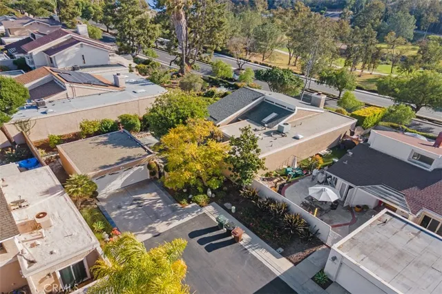 an aerial view of a house with a garden