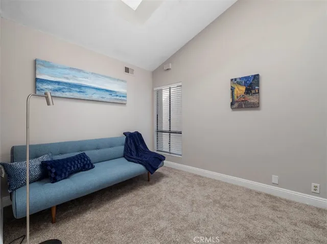 a living room with furniture and a couch