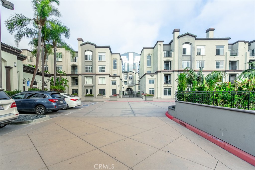 9293 Regents Road, Unit C303 La Jolla, CA 92037 - Photo 26 of 26 a view of multiple houses with a yard