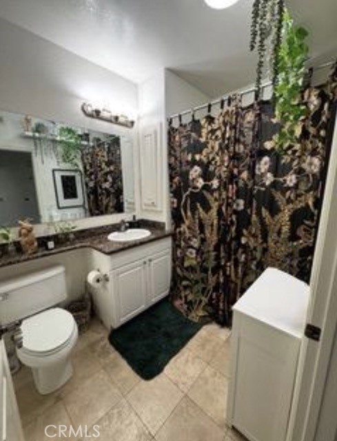 9293 Regents Road, Unit C303 La Jolla, CA 92037 - Photo 7 of 26 a bathroom with a sink toilet and shower