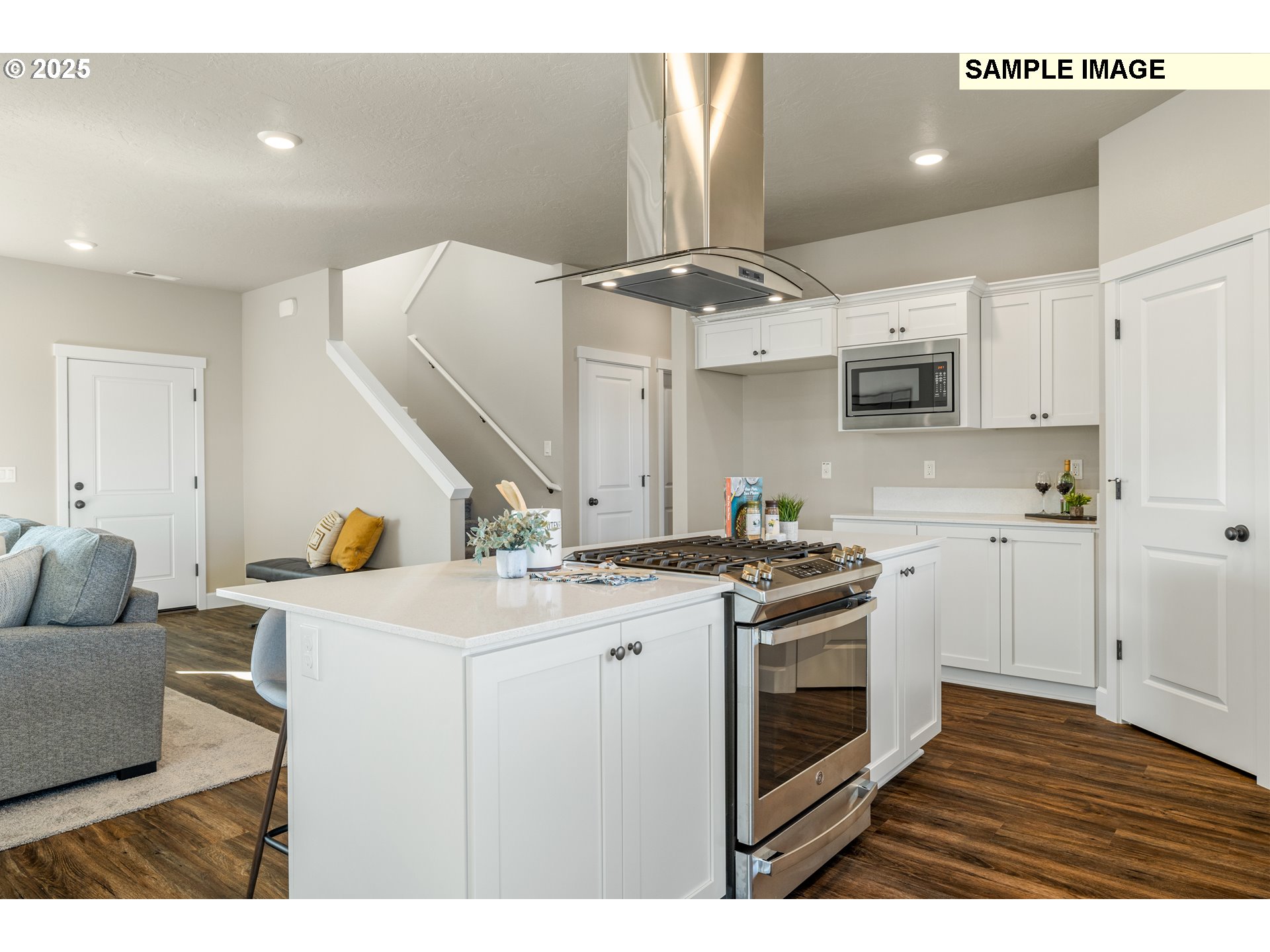 548 Arthur Street Umatilla, OR 97882 - Photo 13 of 36 a kitchen with a stove a sink and a refrigerator