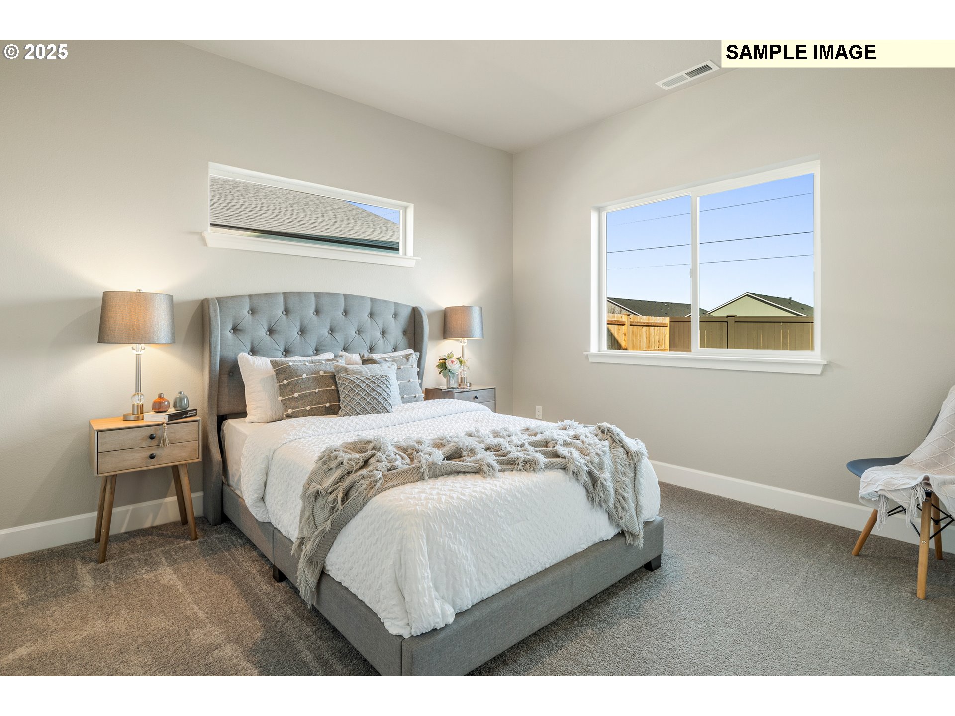 548 Arthur Street Umatilla, OR 97882 - Photo 18 of 36 a bedroom with a bed and a window