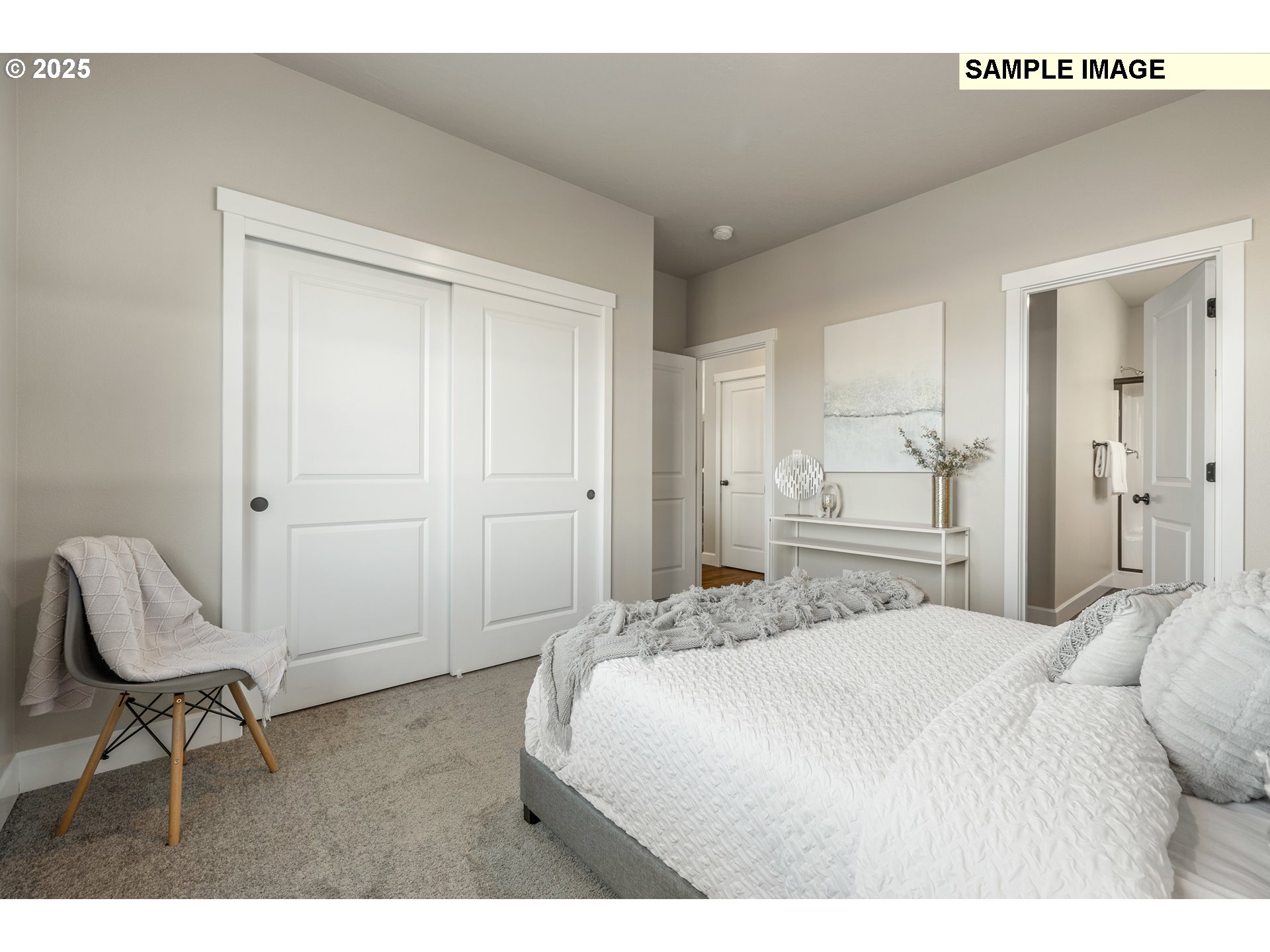 548 Arthur Street Umatilla, OR 97882 - Photo 19 of 36 a bedroom with a bed and a chair