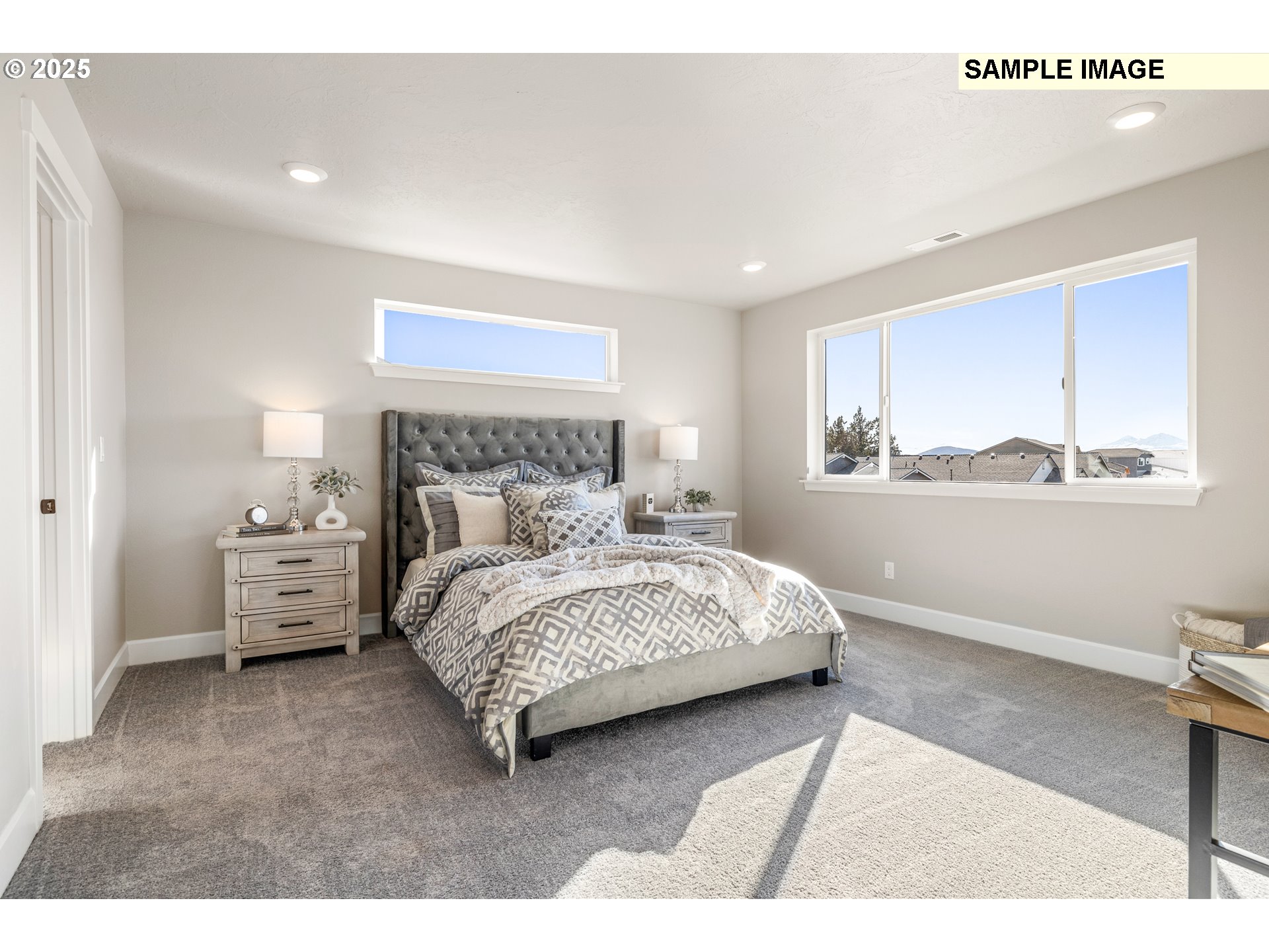 548 Arthur Street Umatilla, OR 97882 - Photo 28 of 36 a bedroom with a bed and a window