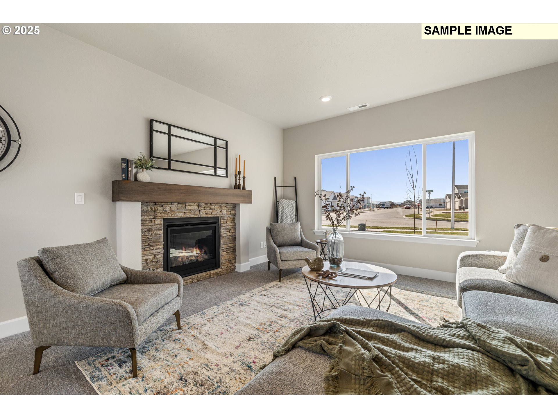 548 Arthur Street Umatilla, OR 97882 - Photo 7 of 36 a living room with furniture and a fireplace