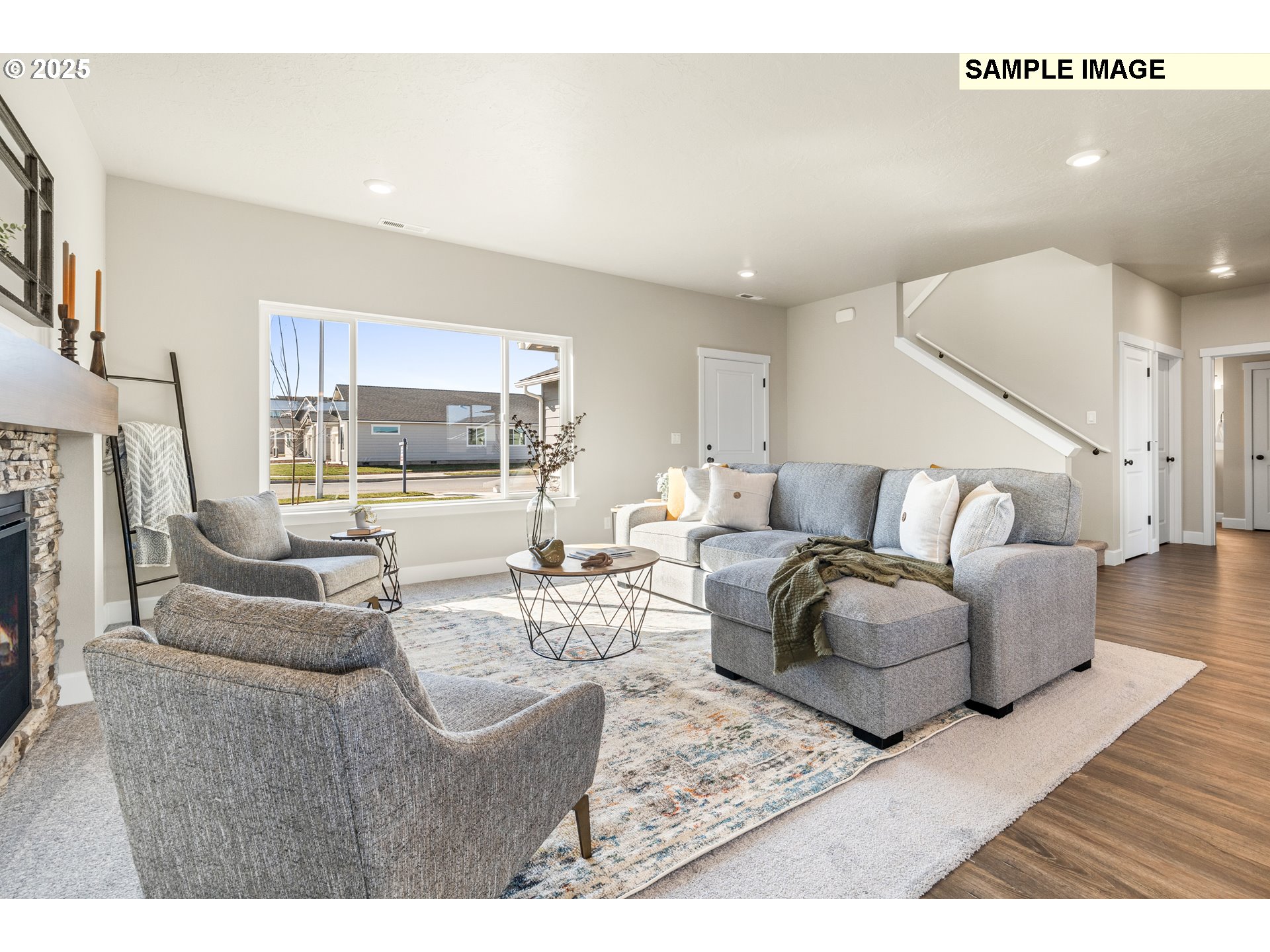 548 Arthur Street Umatilla, OR 97882 - Photo 9 of 36 a living room with furniture and a wooden floor