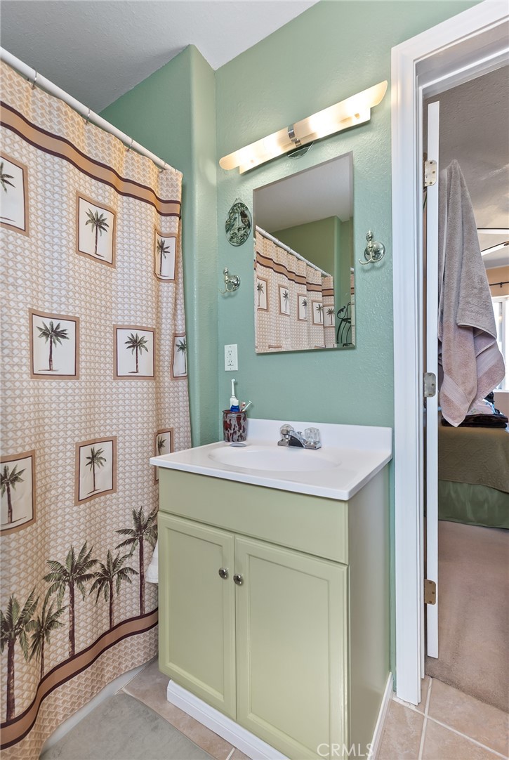 880 Inca Trail Yucca Valley, CA 92284 - Photo 14 of 26 a view of bathroom with a sink and mirror