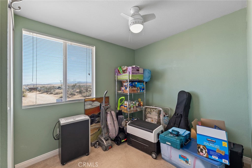 880 Inca Trail Yucca Valley, CA 92284 - Photo 17 of 26 a reading room with furniture and a window