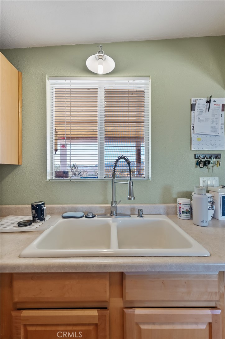 880 Inca Trail Yucca Valley, CA 92284 - Photo 7 of 26 a close view of sink and tap