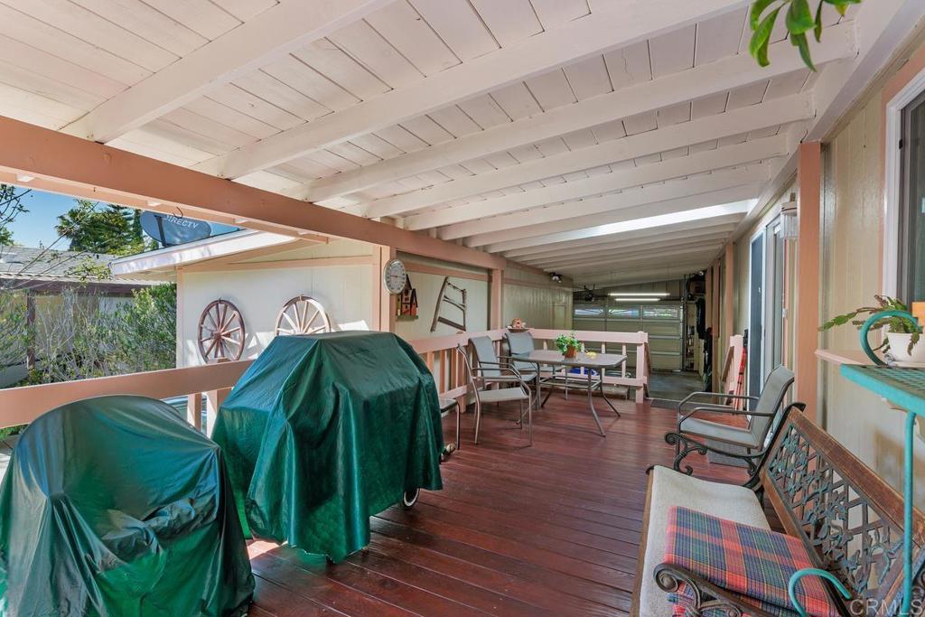 18218 Paradise Mountain Road Valley Center, CA 92082 - Photo 29 of 39 a view of a chairs and table in a patio