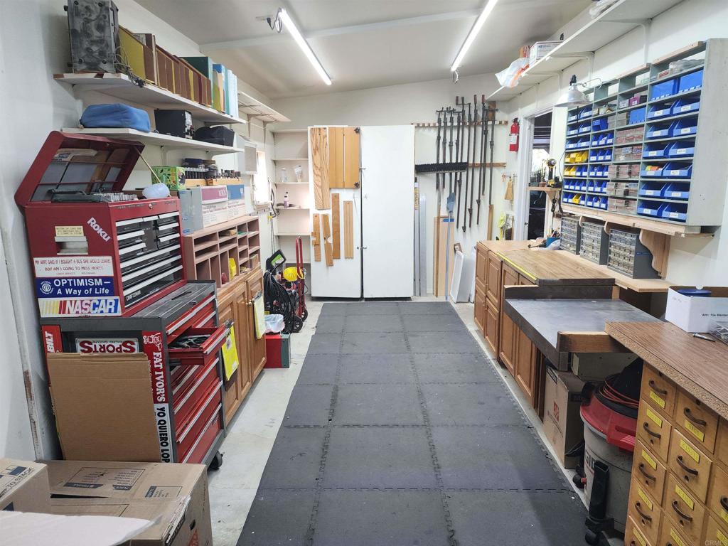 18218 Paradise Mountain Road Valley Center, CA 92082 - Photo 30 of 39 a utility room with dryer and washer