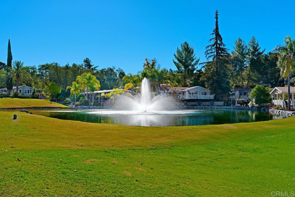 18218 Paradise Mountain Road Valley Center, CA 92082 - Photo 39 of 39 a view of a swimming pool with a yard