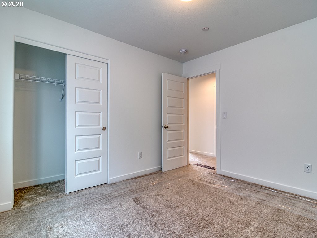 70 South 39th Drive Ridgefield, WA 98642 - Photo 16 of 24 an empty room with closet and cabinet