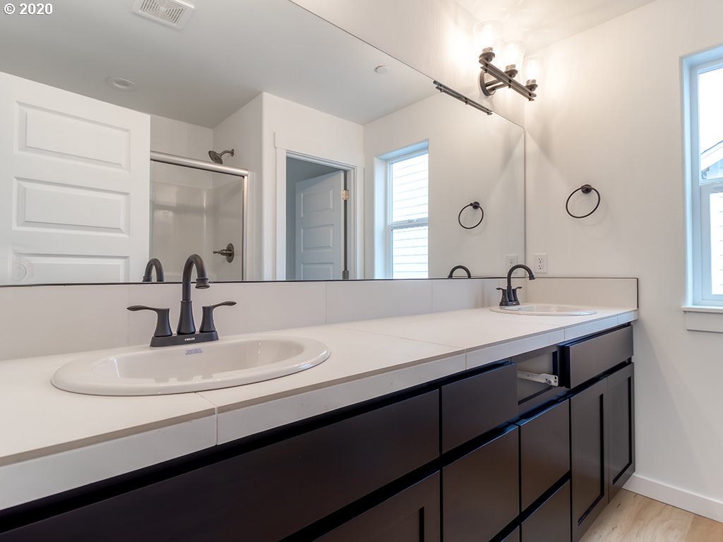 70 South 39th Drive Ridgefield, WA 98642 - Photo 23 of 24 a bathroom with a sink and a mirror