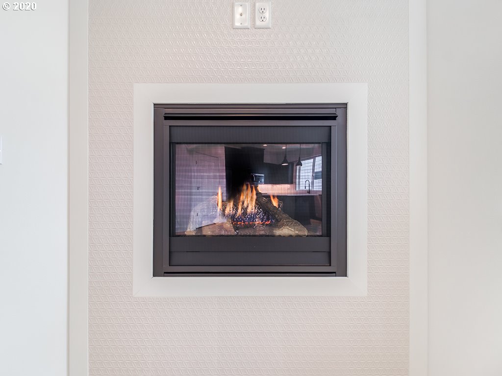 70 South 39th Drive Ridgefield, WA 98642 - Photo 8 of 24 a view of a living room that has a fireplace