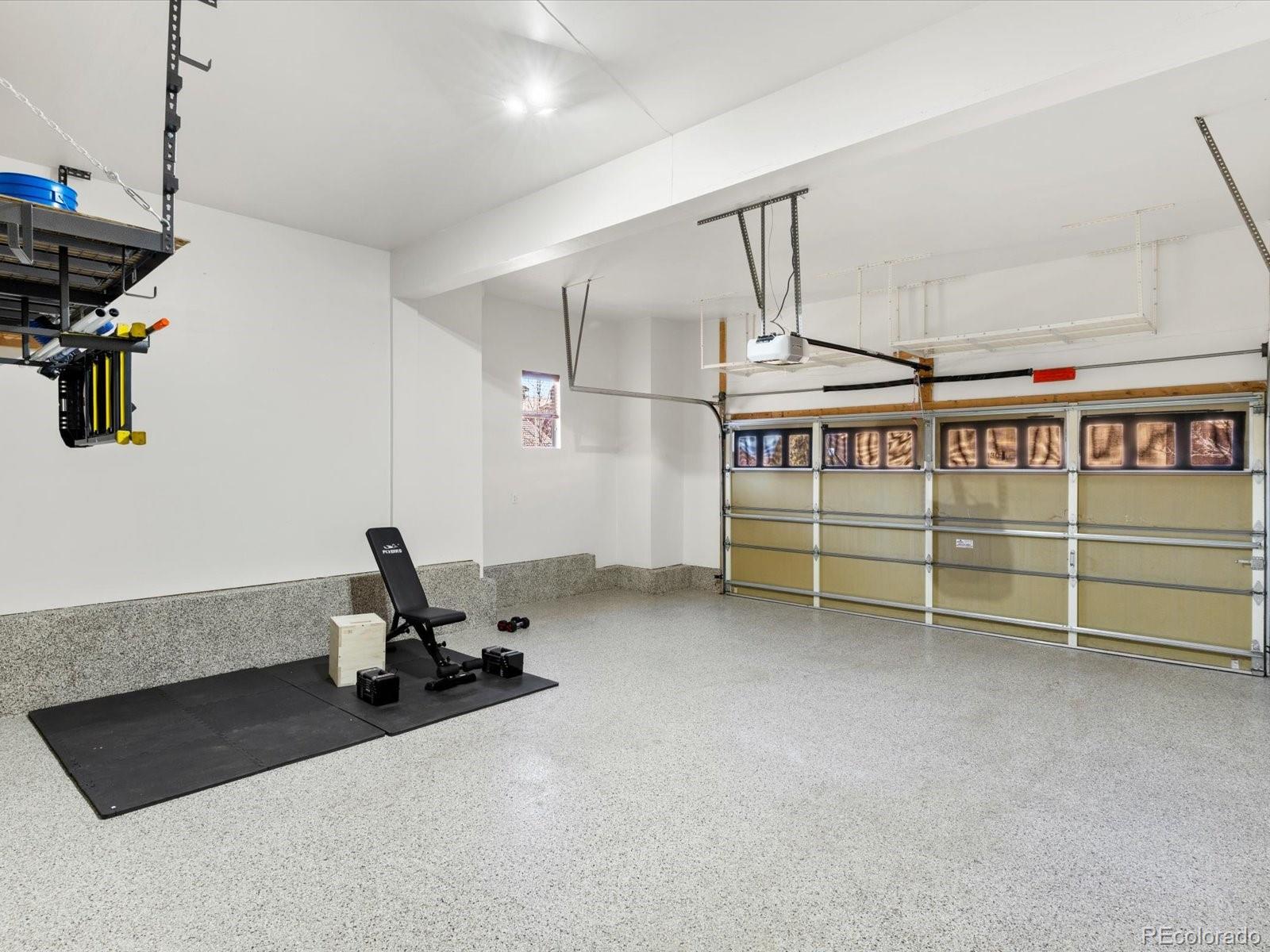 9340 Sori Lane Highlands Ranch, CO 80126 - Photo 36 of 42 a view of a room with gym equipment