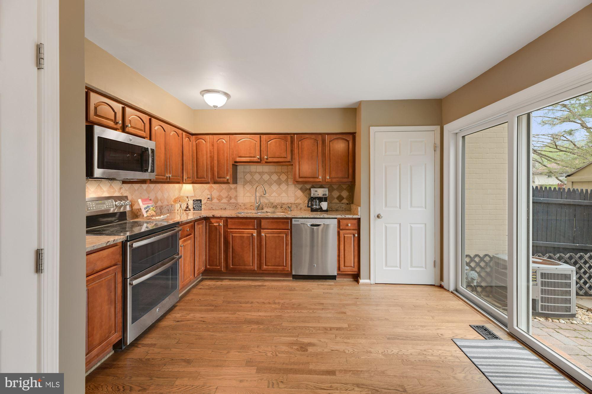 6000 Stoneygate Court Springfield, VA 22152 - Photo 3 of 56 Kitchen with hardwood floors