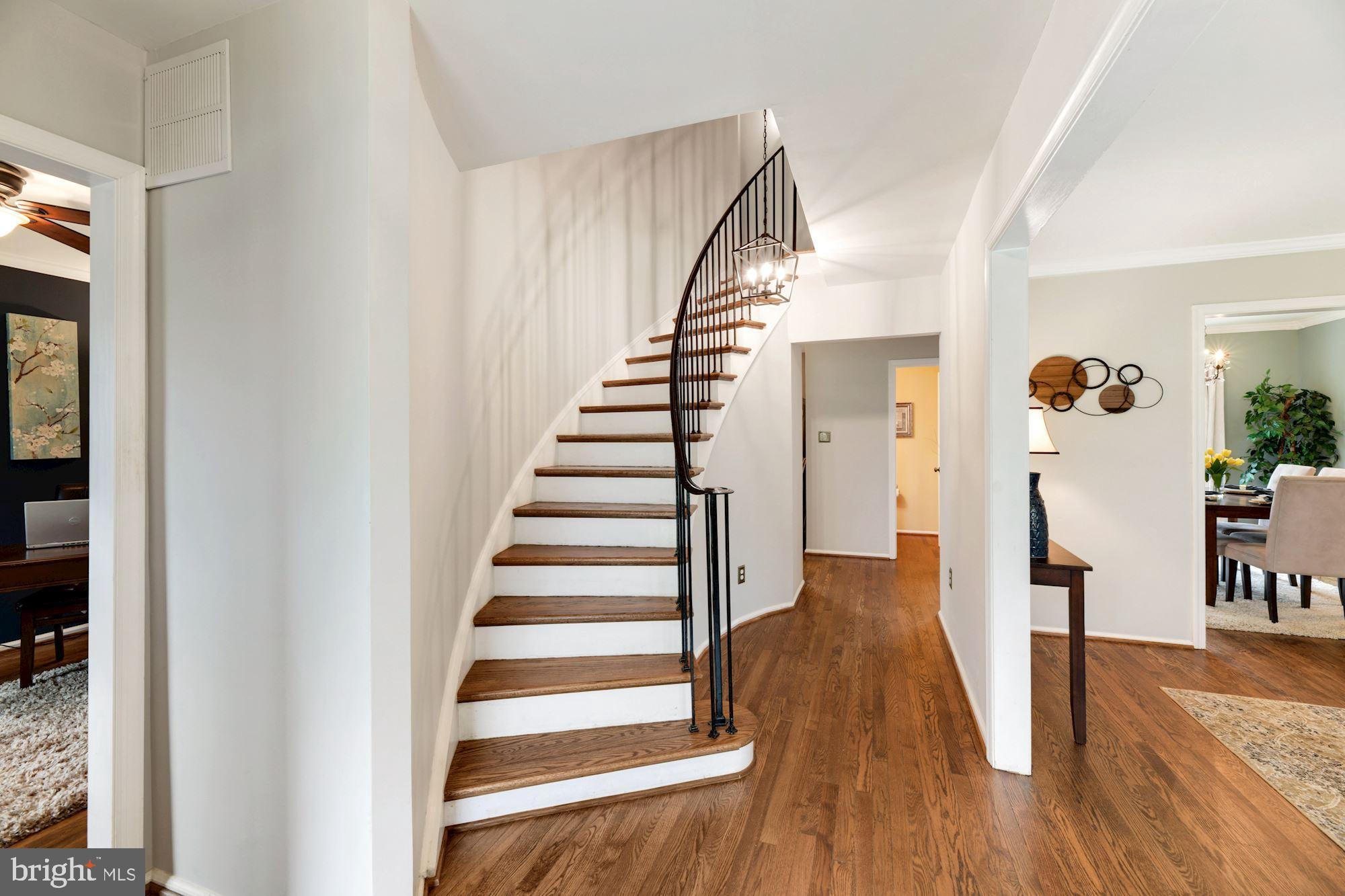 6000 Stoneygate Court Springfield, VA 22152 - Photo 5 of 56 Grand curved stairway entry
