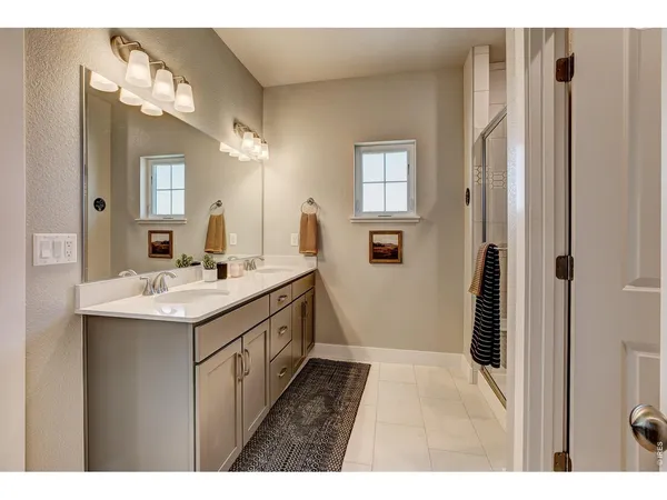 a bedroom with a bed and a cabinets