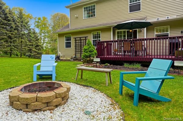 29 Hickory Hill Road Newburgh, NY 12550 - Photo 45 of 47 a view of a chair and table in backyard of the house