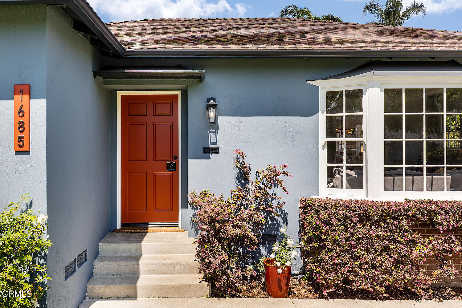 1685 Wagner Street Pasadena, CA 91106 - Photo 3 of 5 a front view of a house with a garden