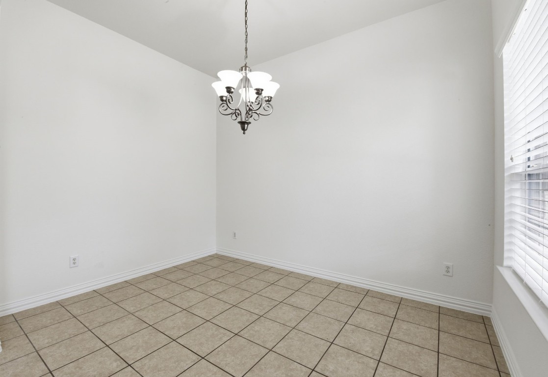 16023 Powder Springs Lane Houston, TX 77070 - Photo 11 of 48 Formal dining. Fresh neutral paint, lots of natural light, tile floors.