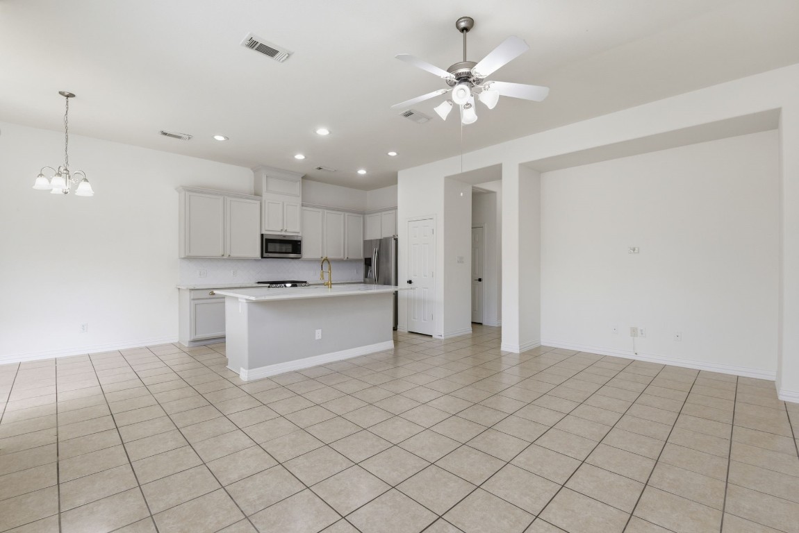16023 Powder Springs Lane Houston, TX 77070 - Photo 13 of 48 You will be the host with the most in this new home! That counter level island welcomes you right into the updated kitchen!