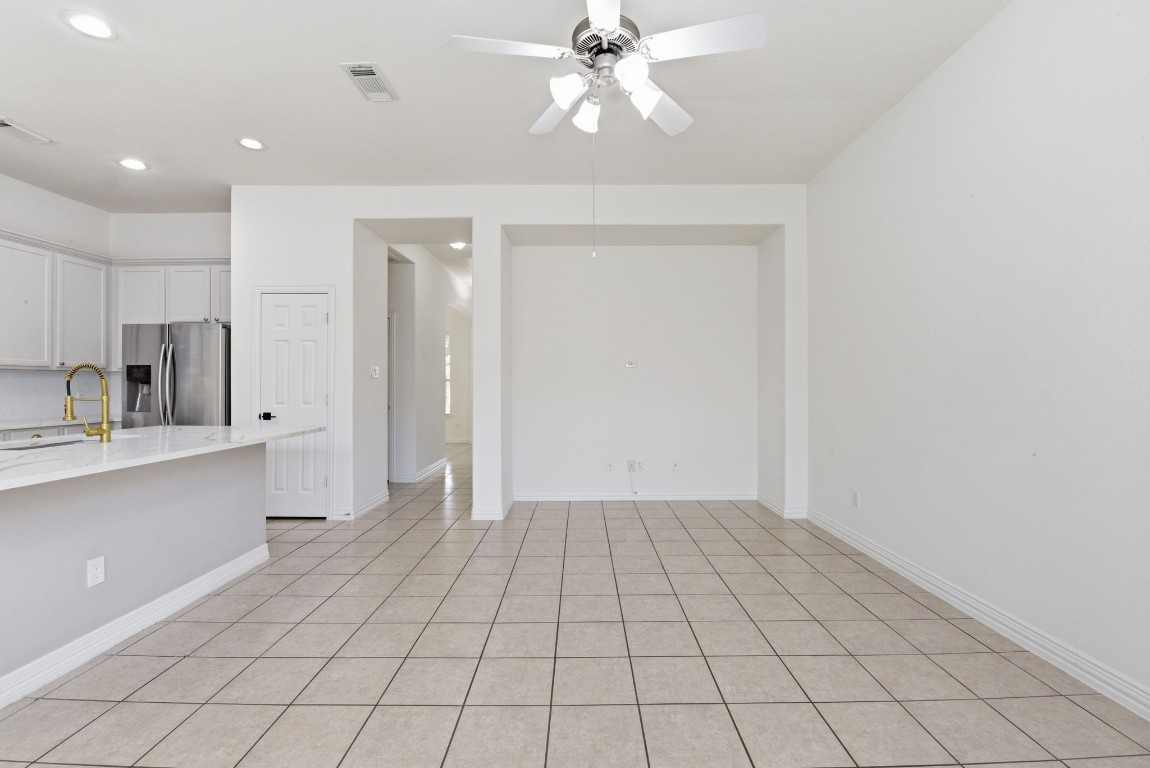 16023 Powder Springs Lane Houston, TX 77070 - Photo 15 of 48 Look from living room back toward the entry hallway. Take a peek to your left at that kitchen! Swoon!