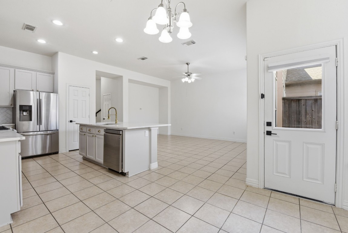 16023 Powder Springs Lane Houston, TX 77070 - Photo 24 of 48 A look from the breakfast room out toward the living room. So much open space. The door on the right leads to the outdoor patio area.