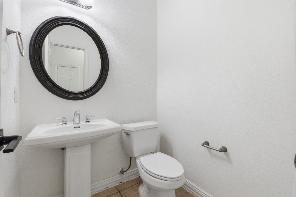 16023 Powder Springs Lane Houston, TX 77070 - Photo 27 of 48 Half bath downstairs with fresh paint!