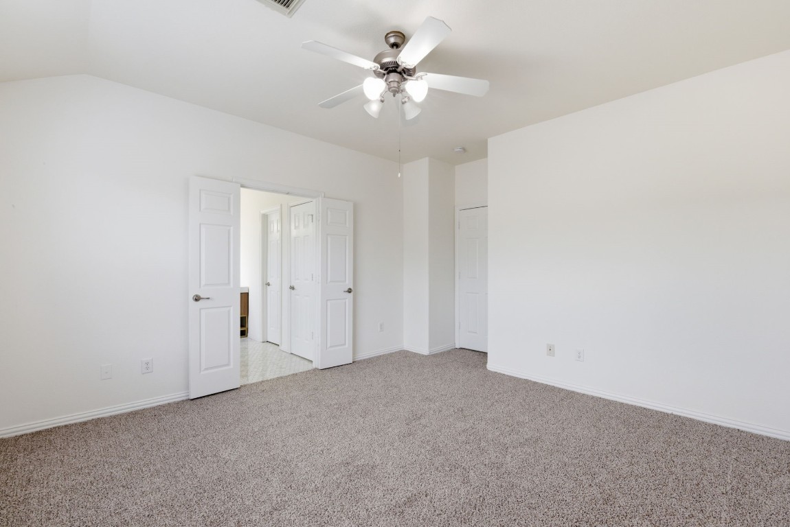 16023 Powder Springs Lane Houston, TX 77070 - Photo 30 of 48 The primary bedroom has an ensuite bath with a double door entry.