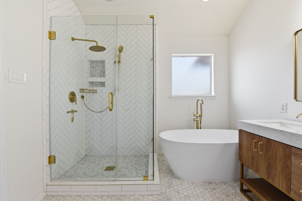 16023 Powder Springs Lane Houston, TX 77070 - Photo 33 of 48 Another look at this completely remodeled primary bath with gold hardware and fixtures.