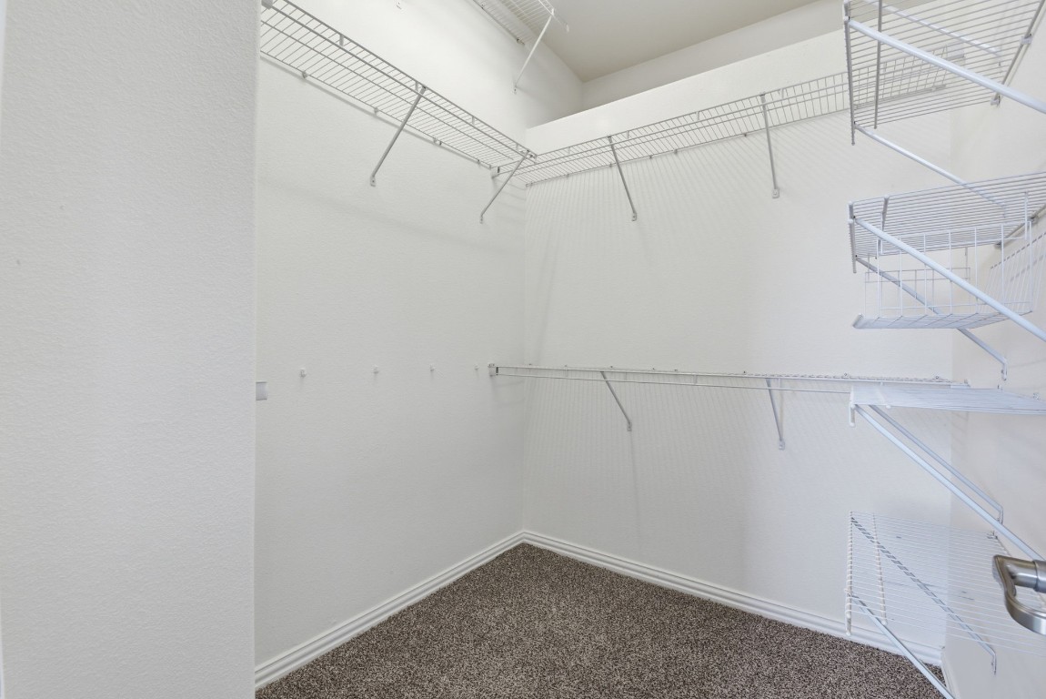 16023 Powder Springs Lane Houston, TX 77070 - Photo 34 of 48 Huge walk in closet in the primary bedroom!