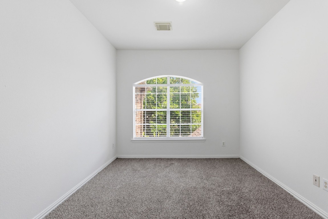 16023 Powder Springs Lane Houston, TX 77070 - Photo 36 of 48 Another look at bedroom number two that looks out to the front of the house.