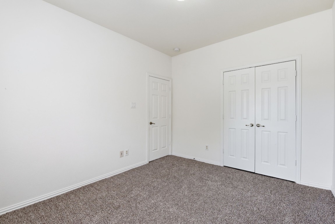 16023 Powder Springs Lane Houston, TX 77070 - Photo 37 of 48 The second bedroom upstairs with large closet.