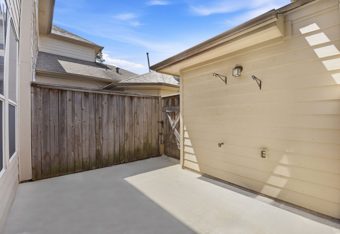16023 Powder Springs Lane Houston, TX 77070 - Photo 42 of 48 The outdoor patio with plenty of room for a cute table with chairs and for your grill!