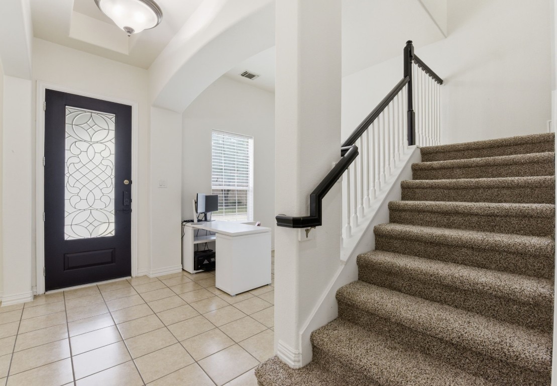 16023 Powder Springs Lane Houston, TX 77070 - Photo 6 of 48 Another look at the entry with a glance at the home office area and the stairs. (Recently replaced carpet on the stairs!)