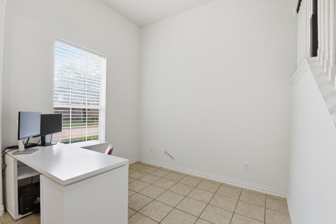 16023 Powder Springs Lane Houston, TX 77070 - Photo 8 of 48 Flex space off of the entry, currently used as a home office.