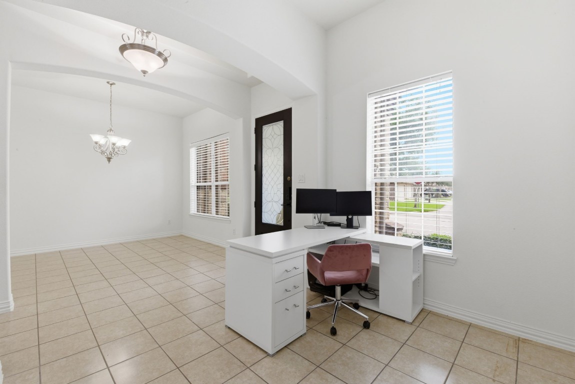 16023 Powder Springs Lane Houston, TX 77070 - Photo 9 of 48 A look from the home office area toward the dining room. Notice the fresh neutral paint and the natural light pouring in from the windows!