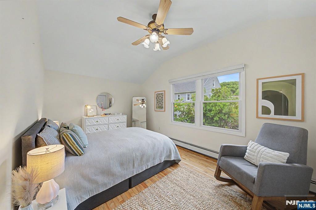 45 Highfield Road Bloomfield, NJ 07003 - Photo 33 of 50 a bedroom with a bed and a couch