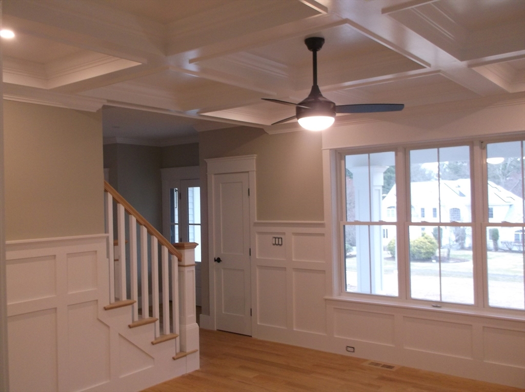 Lot 8 Pond View Holliston, MA 01746 - Photo 17 of 30 a view of a room with wooden floor fan and windows