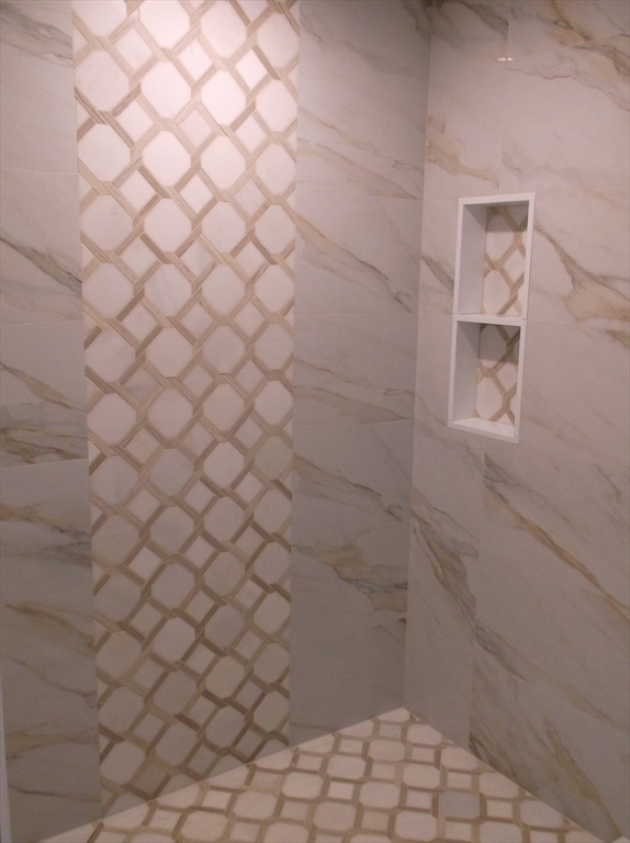 Lot 8 Pond View Holliston, MA 01746 - Photo 25 of 30 a bathroom with a white shower