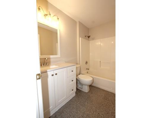 4 Jasmine Drive Worcester, MA 01605 - Photo 14 of 23 a bathroom with a granite countertop sink toilet and shower