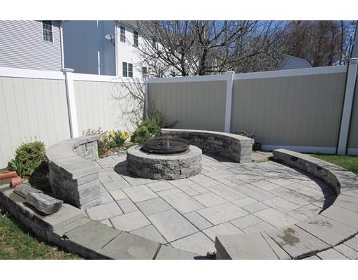 4 Jasmine Drive Worcester, MA 01605 - Photo 19 of 23 a bedroom with a bed and a potted plant