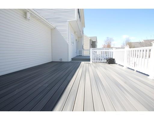 4 Jasmine Drive Worcester, MA 01605 - Photo 20 of 23 a view of terrace with wooden floor and fence