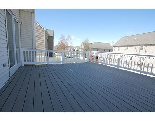 4 Jasmine Drive Worcester, MA 01605 - Photo 21 of 23 a view of a balcony with wooden floor