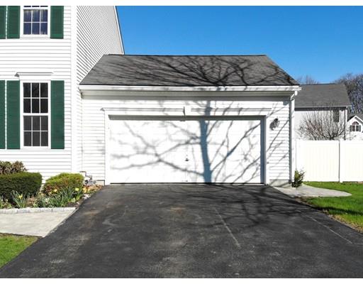 4 Jasmine Drive Worcester, MA 01605 - Photo 23 of 23 a view of backyard with a barbeque grill and potted plants