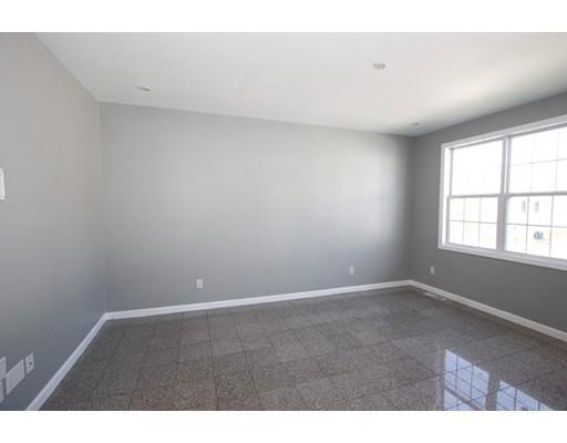 4 Jasmine Drive Worcester, MA 01605 - Photo 6 of 23 a view of an empty room with a window