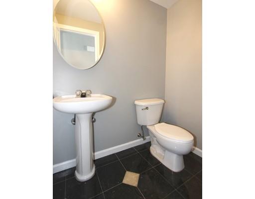 4 Jasmine Drive Worcester, MA 01605 - Photo 7 of 23 a bathroom with a sink toilet and a mirror