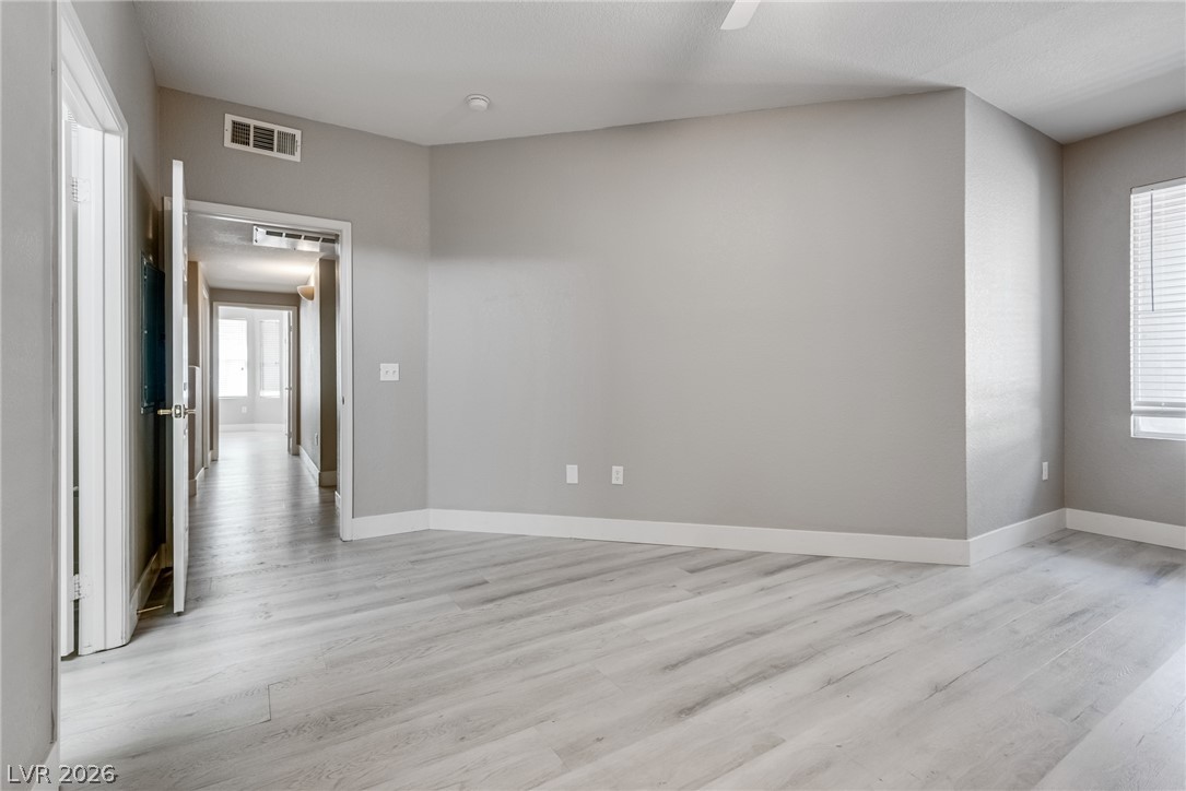 10550 West Alexander Road, Unit 1139 Las Vegas, NV 89129 - Photo 21 of 27 Naturally illuminated interiors with light-toned flooring offer a canvas for personalized design.